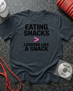 Eating Snacks (Pink >) T-Shirt